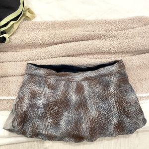 Outdoor Voices blue and brown tennis skirt